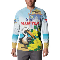 Light blue button sweatshirt worn by model; front graphic shows Sint Maarten pelican