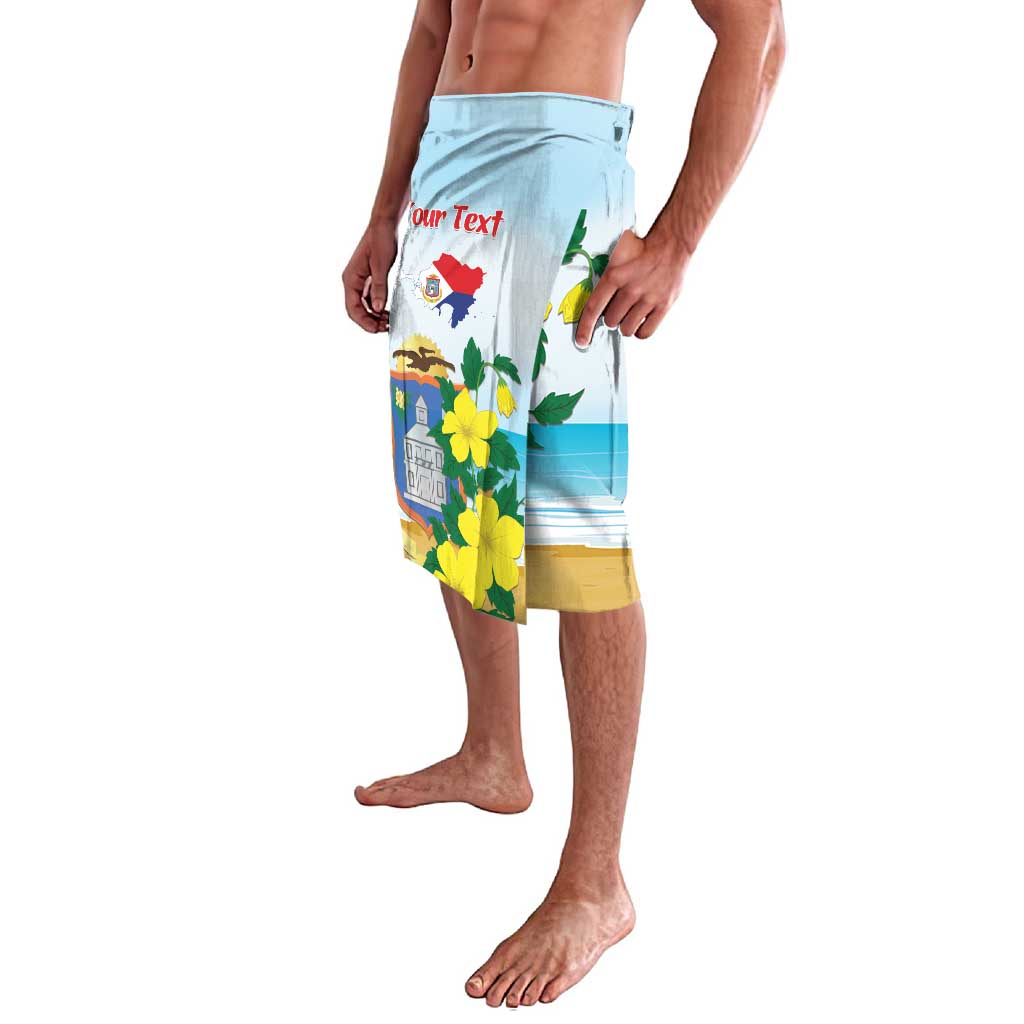 Personalized blue shorts with yellow hibiscus, Sint Maarten emblem, and 'Your Text' lettering