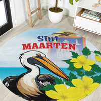 Round blue area rug with pelican and yellow flowers, featuring Sint Maarten lettering