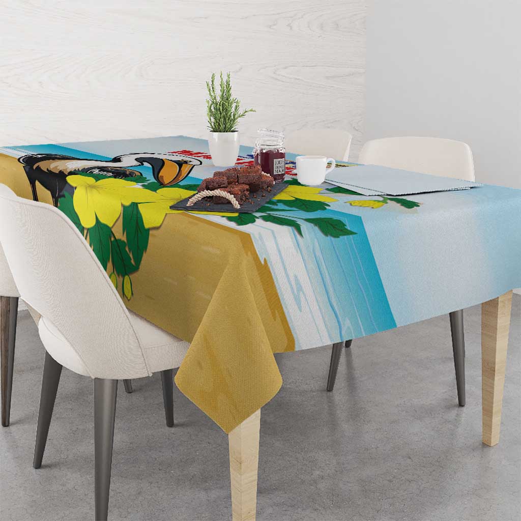 Blue tablecloth with pelican and green foliage accents, corner drape view.
