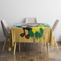 Blue tablecloth with pelican and floral print, centered on dining table.