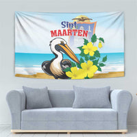 Pelican and yellow-flower wall tapestry with blue seaside band and bold 'Sint MAARTEN' lettering