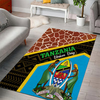 Rectangular area rug featuring brown lattice, black geometric stripes, and blue Tanzania Union Day design