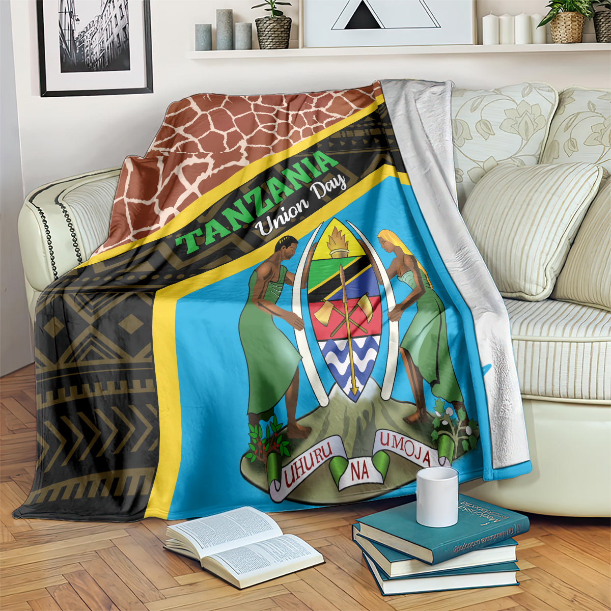 Brown, white giraffe-pattern blanket with blue emblem panel and yellow/black trim