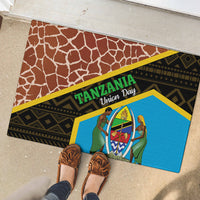 Brown rubber doormat with blue Tanzania Union Day design and black geometric trim