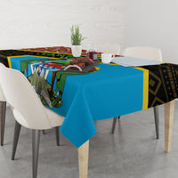 Square tablecloth with blue center panel, giraffe motif, and dark geometric trim
