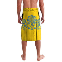 Blue-and-yellow lavalava skirt with Swedish ornament print and heart motifs, rear view