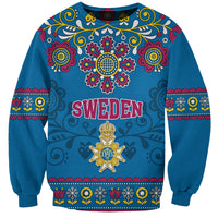Unisex blue sweatshirt with Sweden text, ornate floral crown medallion and badge graphic