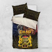 Bedding set flat lay with duvet and two pillowcases in dark green geometric pattern and CHAD crest
