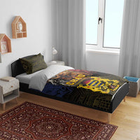 Bedding set on bed with dark green geometric duvet panel and centered CHAD crest in gold