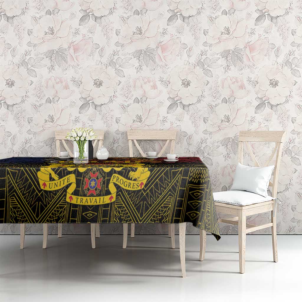 African patterned tablecloth with crest motif, dark base with green and red accents