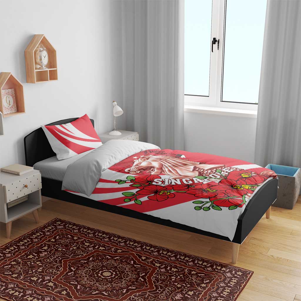 Red and white bedding set on a bed; merlion graphic with red orchid flowers