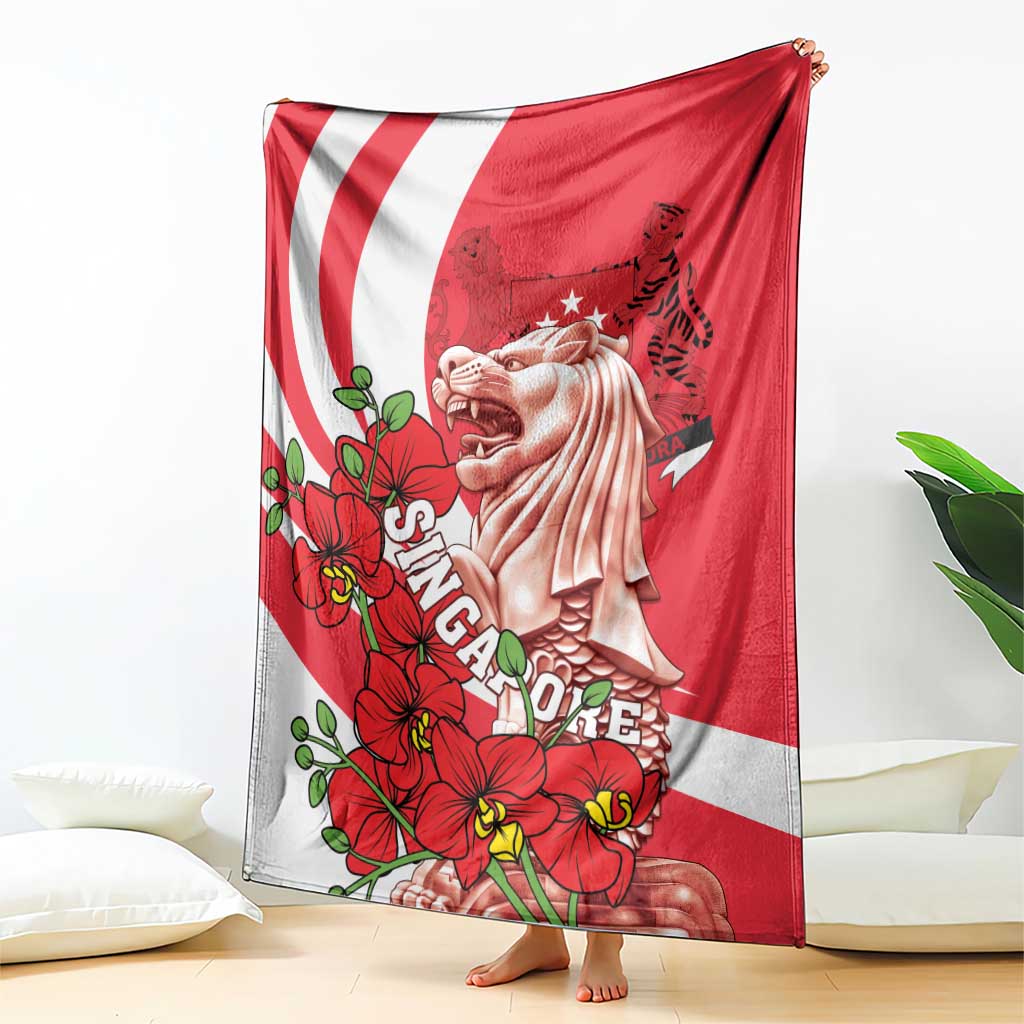 Red and white Singapore themed throw blanket with Merlion figure and red flowers