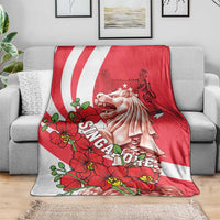 Red and white Merlion themed blanket with Singapore text and floral pattern
