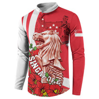 Red button sweatshirt with merlion graphic, floral border, and Singapore flag sleeve print