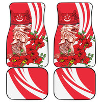 Set of four red car mats with Merlion lion figure, wavy white stripes, floral design
