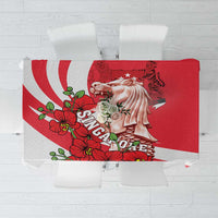Red tablecloth with white diagonal stripe and Merlion with red orchid floral print.