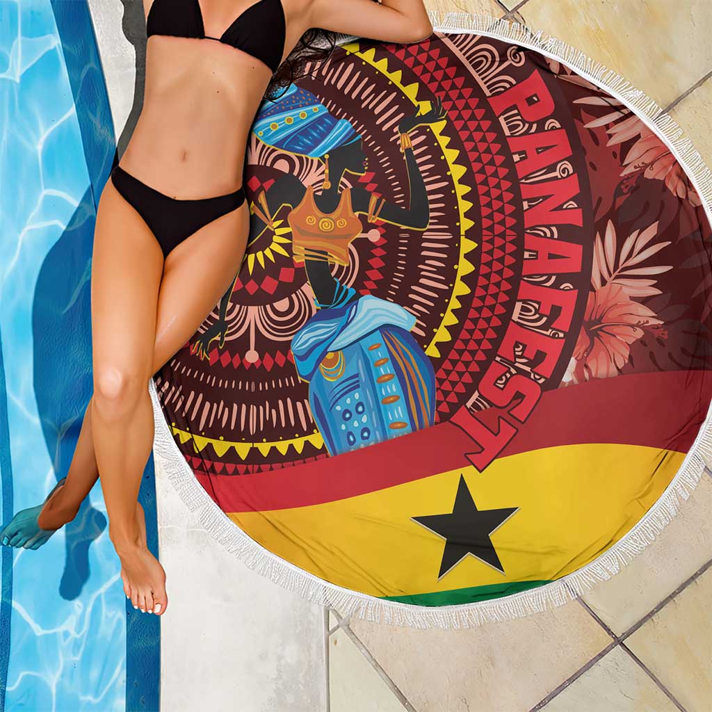 Round beach blanket with fringed border, blue-dressed woman on red-yellow-black print.