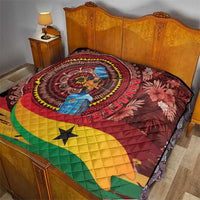 Panafest quilt on bed, Ghana-inspired portrait medallion with floral print, red maroon, star