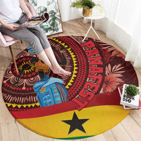 Round red rug with colorful tropical motifs and a large yellow star centered
