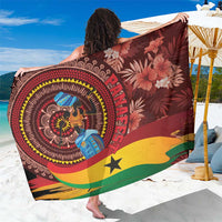 Maroon patterned sarong with Ghana flag colors, lion and floral motif