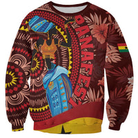 Unisex red sweatshirt with colorful African-style animal and geometric pattern