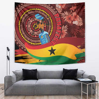 Red Ghana tapestry wall hanging with circular portrait figure and tropical flower pattern