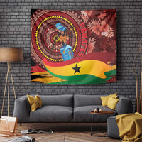 Ghana tapestry wall hanging with circular portrait, black star, and red tropical blossoms