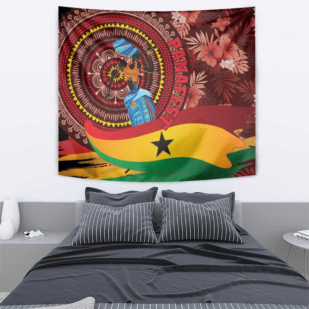 Red Ghana tapestry wall hanging featuring circular face design, star, and floral accents