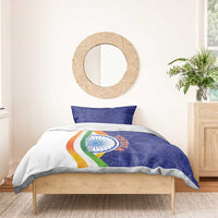 India-themed bedding set: blue paisley top, white tricolor stripe panel with Ashoka emblem on duvet