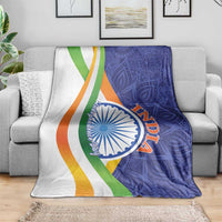 India flag style blanket with white field, blue paisley, and multicolor diagonal stripes