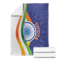 India themed blanket set with blue paisley panel, emblem, and multicolor stripes