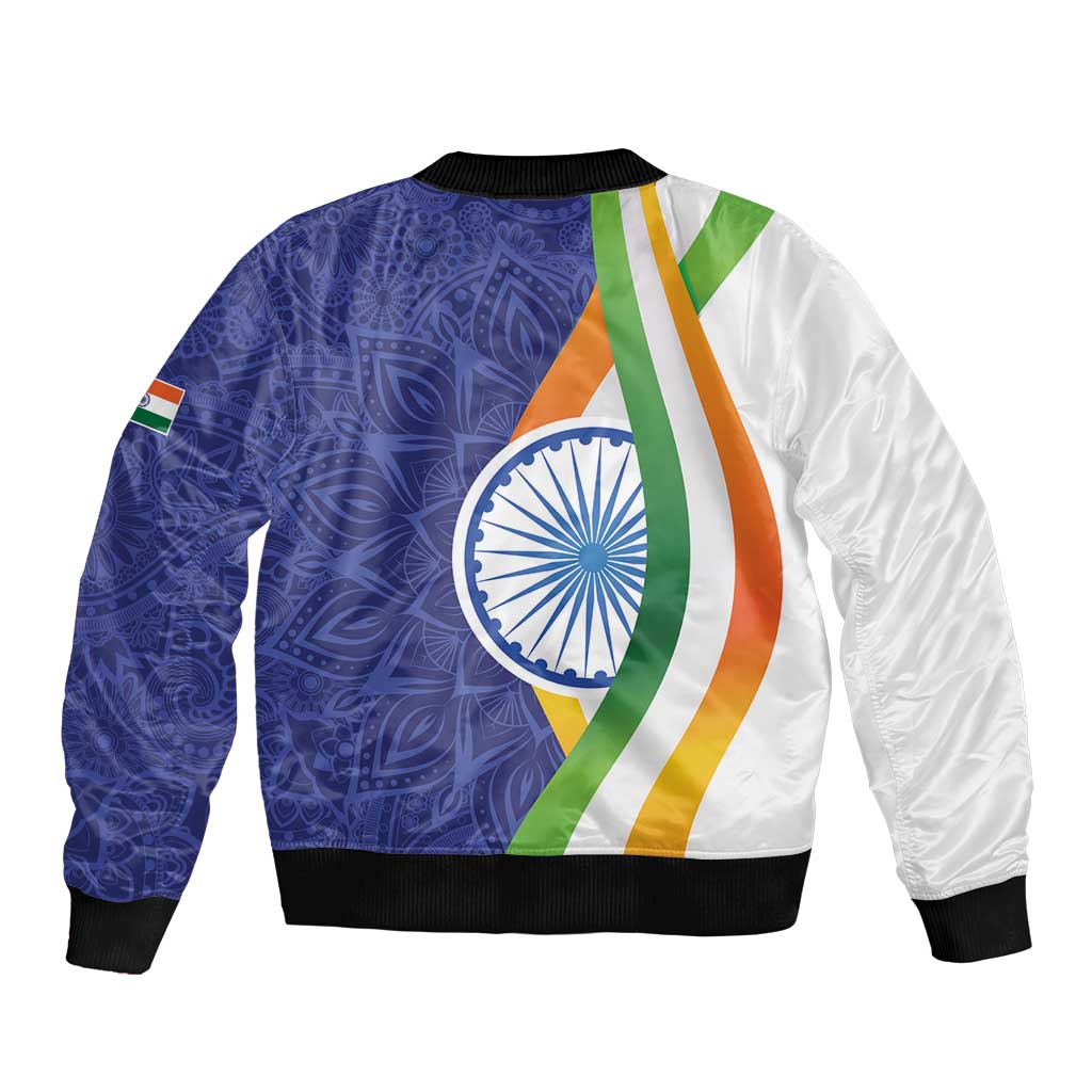 Unisex bomber jacket back, blue paisley mandala, centered emblem, multicolor flag stripes, rib hem