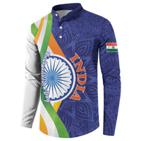 Colorful button henley sweatshirt, blue paisley front with tricolor stripes and circular emblem