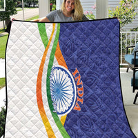 Quilt blanket with diamond quilting, white panel, navy panel, tricolor band, and circular emblem