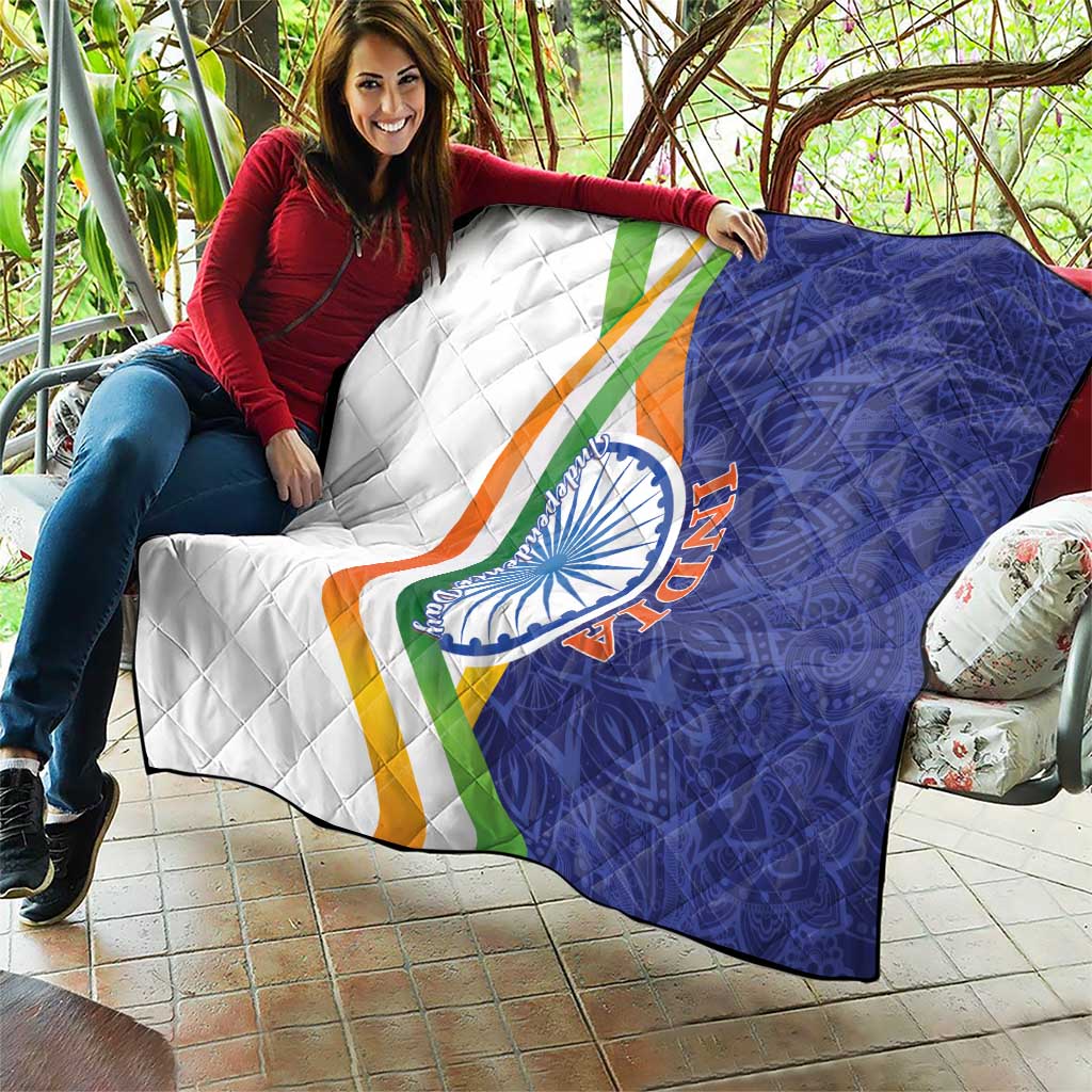 Quilt blanket with diamond quilting, white-left and blue-right sections, tricolor band, emblem