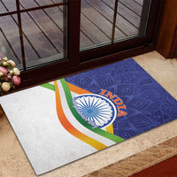 Rubber doormat with blue paisley and tricolor stripes, 'INDIA' emblem near entryway