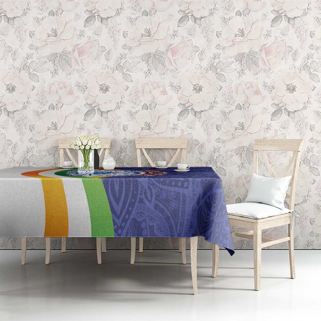 Blue paisley mandala tablecloth with tricolor stripe design on table