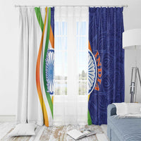 Window curtain set with overlapping colors: blue paisley panel and white tricolor stripe panel