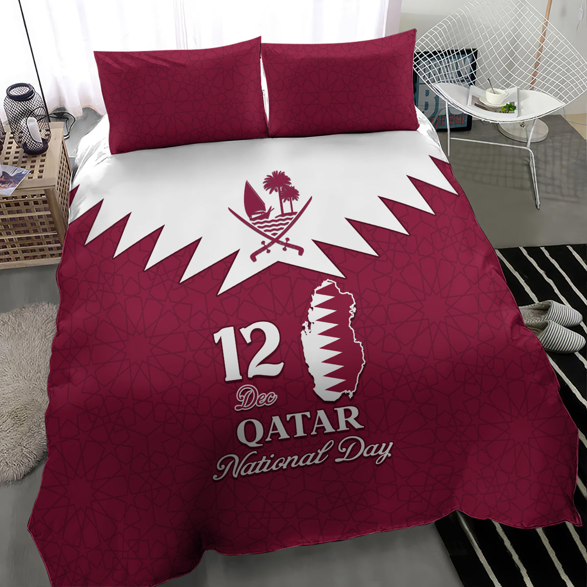 Red bedding set with two square pillows and central white emblem with “12 Dec” text