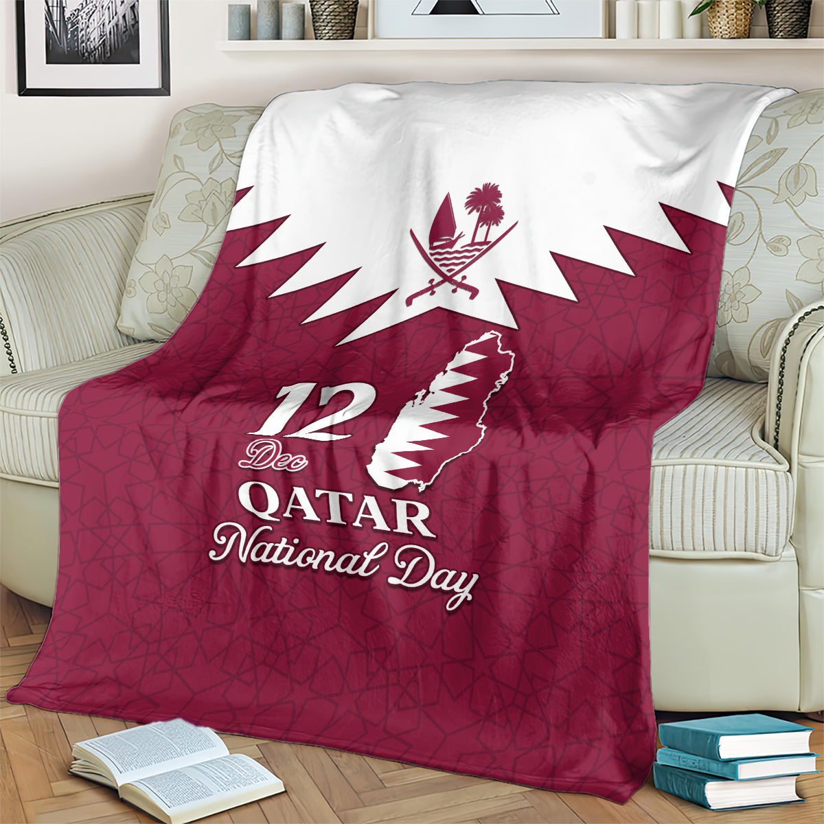 Red Qatar National Day blanket with white Qatar map, 12 Dec lettering, and emblem