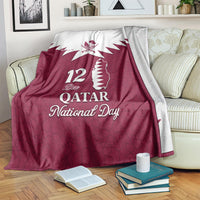 Red Qatar National Day blanket with white Qatar map silhouette and emblem, 12 Dec text
