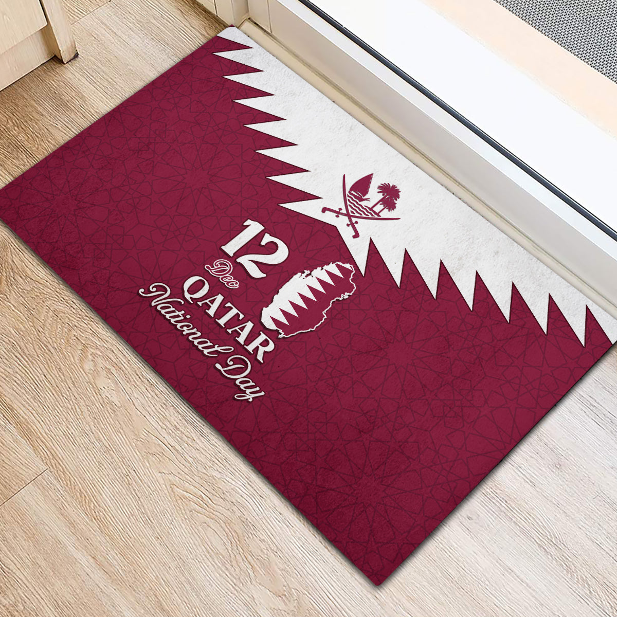 Red rubber doormat with white Qatar map, palm emblem, and 'Qatar National Day' text