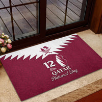 Red rubber doormat with white Qatar map and '12 Dec Qatar National Day' lettering