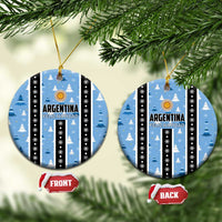 Blue circle Argentina Feliz Navidad ornament with striped design, gold sun, and hanging loop.