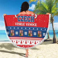 Red round beach blanket showing Czech crest and “CZECH VESELE VANOC(E)”, blue holiday band fringe