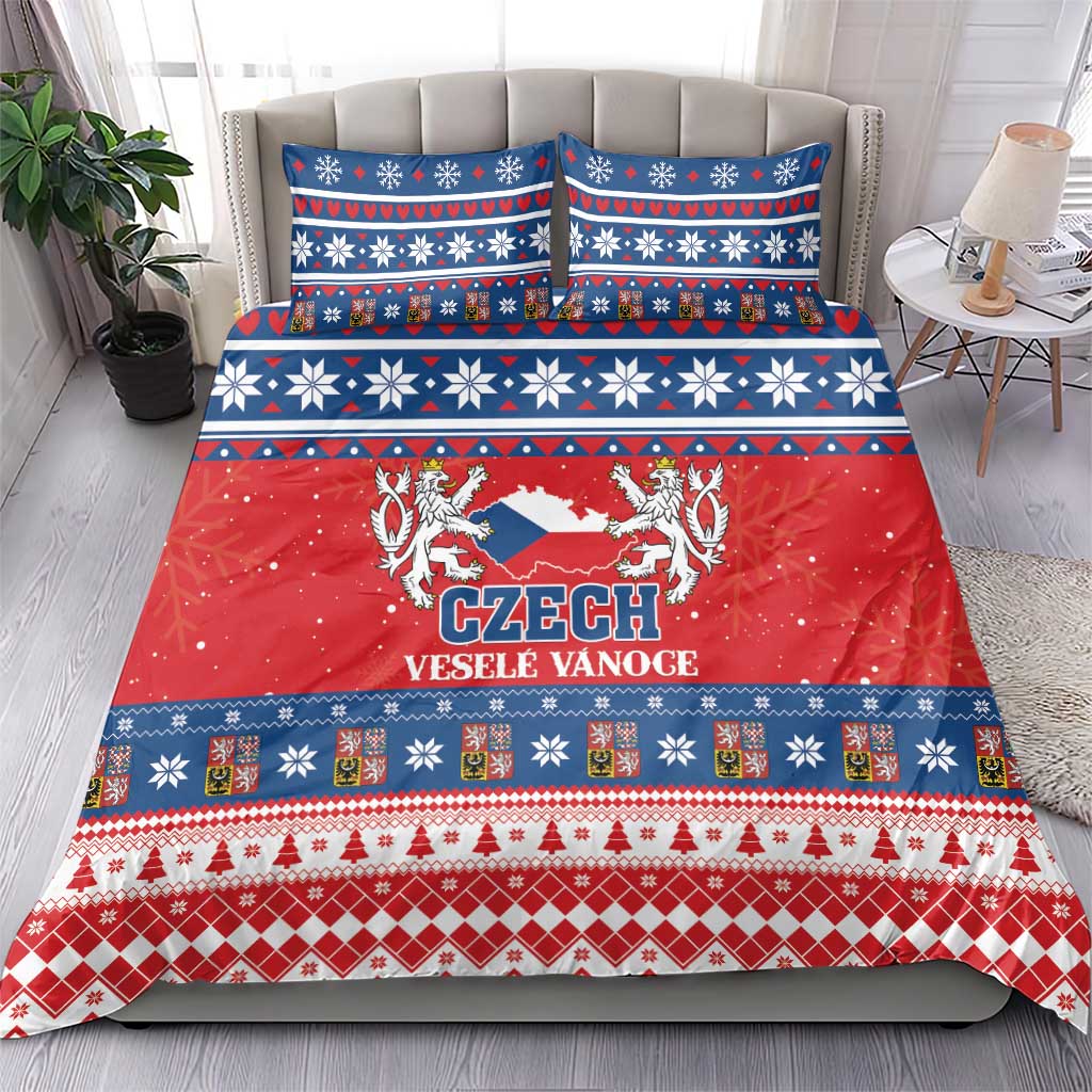 Czech Christmas bedding set on bed with matching red, blue, and white duvet and pillowcases.