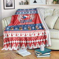 Red, blue, and white Czech Christmas blanket with festive patterns and lettering.