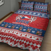Red and navy Czech Christmas quilt bed set with large central Czech crest, includes two pillows