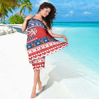 Red Czech Christmas sarong with blue band, snowflake icons, and red-and-white bottom pattern